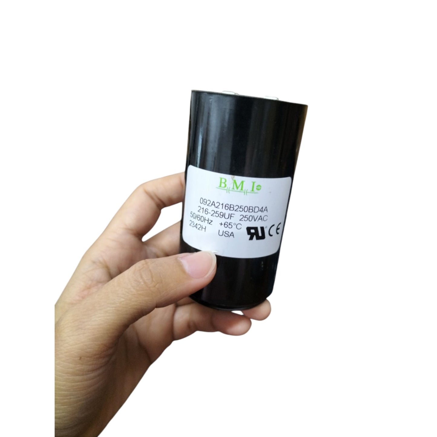 BMI 216-259MFD AC capacitor 250V in hand, ideal for electrical circuits and appliance repairs