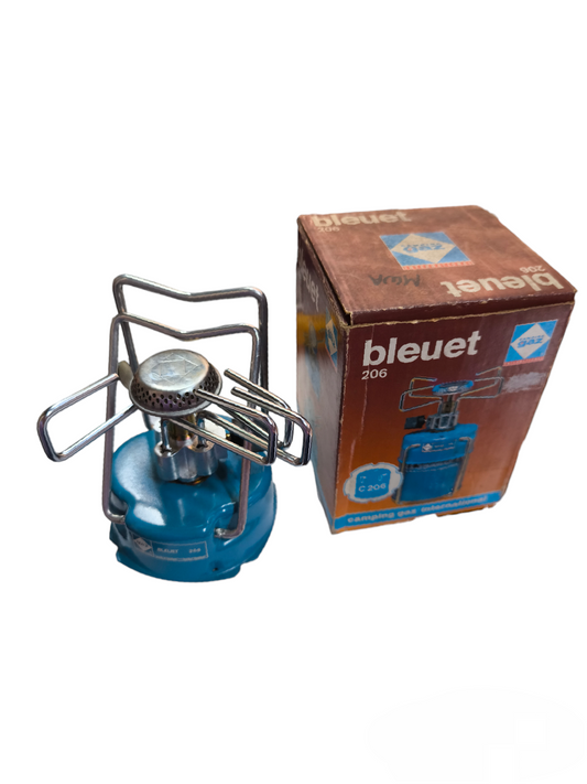 bleuet 206 camping gas stove with blue base and metal burner alongside its original packaging box