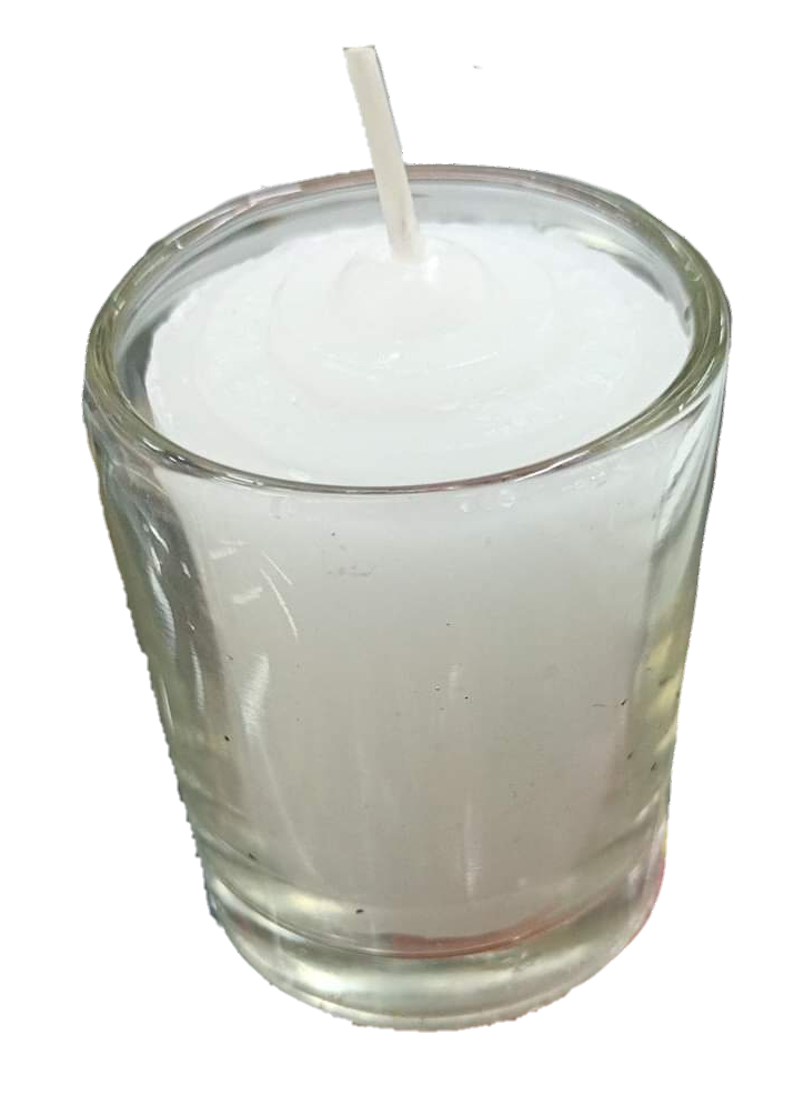 Local candle with glass white in a clear glass holder perfect for home decor and ambiance