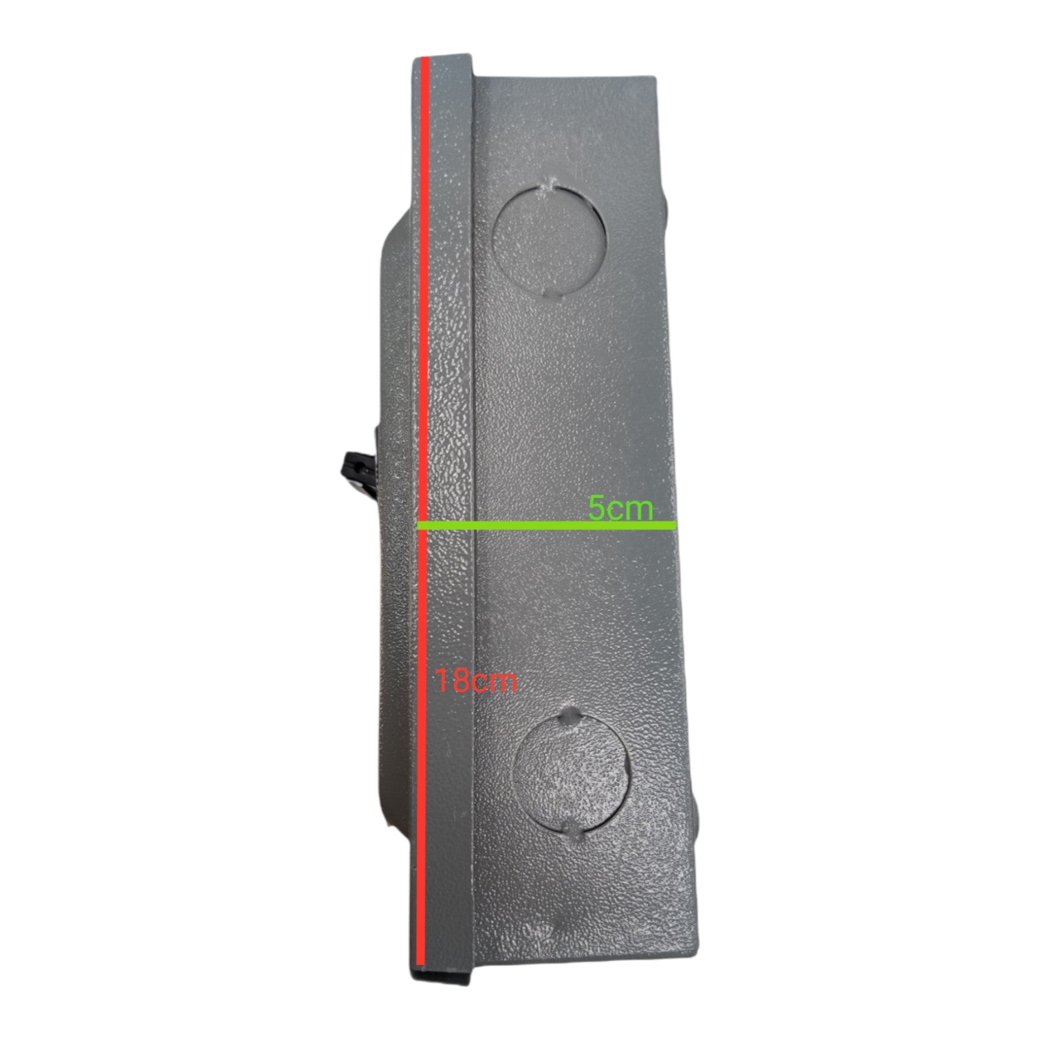 Black rectangular object with measurement markings on a white background