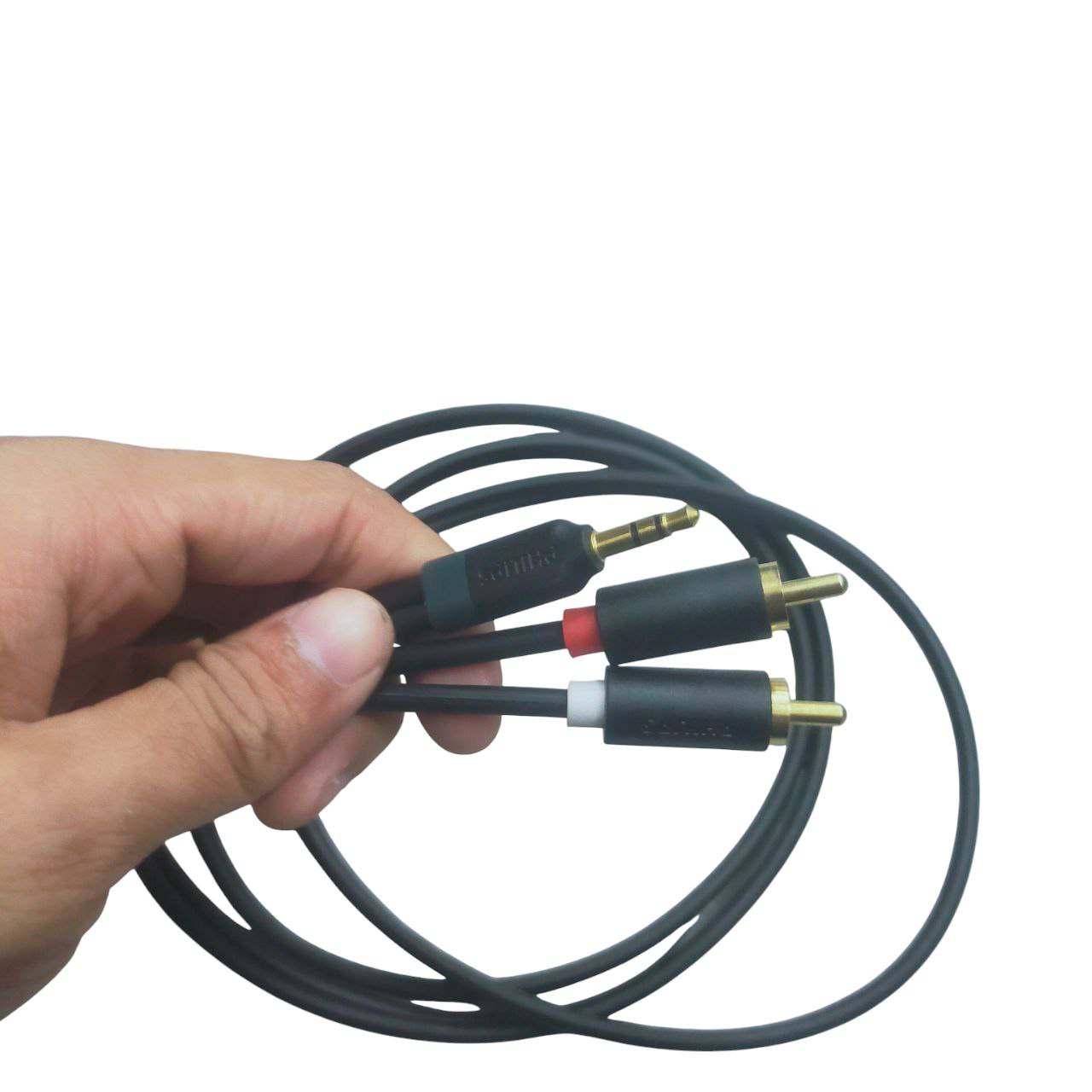 Durable RCA to aux cable in hand, featuring gold-plated connectors for optimal audio quality