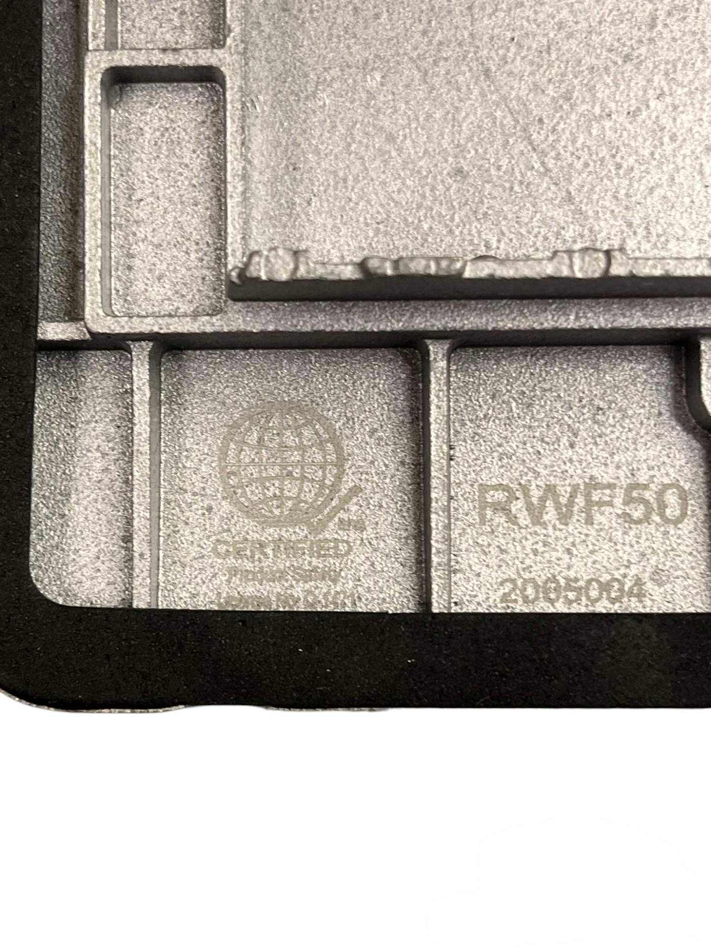 Close-up of Royu Floor Outlet 4 Port USB Outlet 2100mAh metal base with certification markings