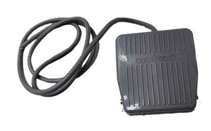 Gray Foot Switch 10A 250V with ridged surface and attached black power cable