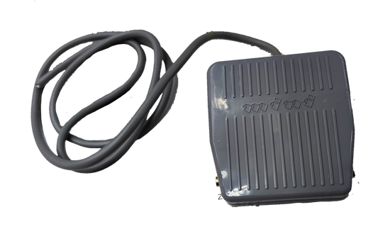 Gray Foot Switch 10A 250V with ridged surface and attached black power cable