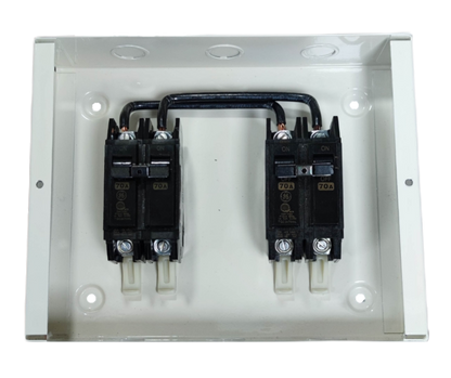 GE Koten electrical switchgear with black circuit breakers mounted inside white metal enclosure