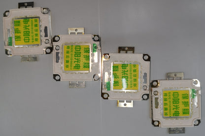 China made 20w high power LED chip modules arranged in a row on a gray surface