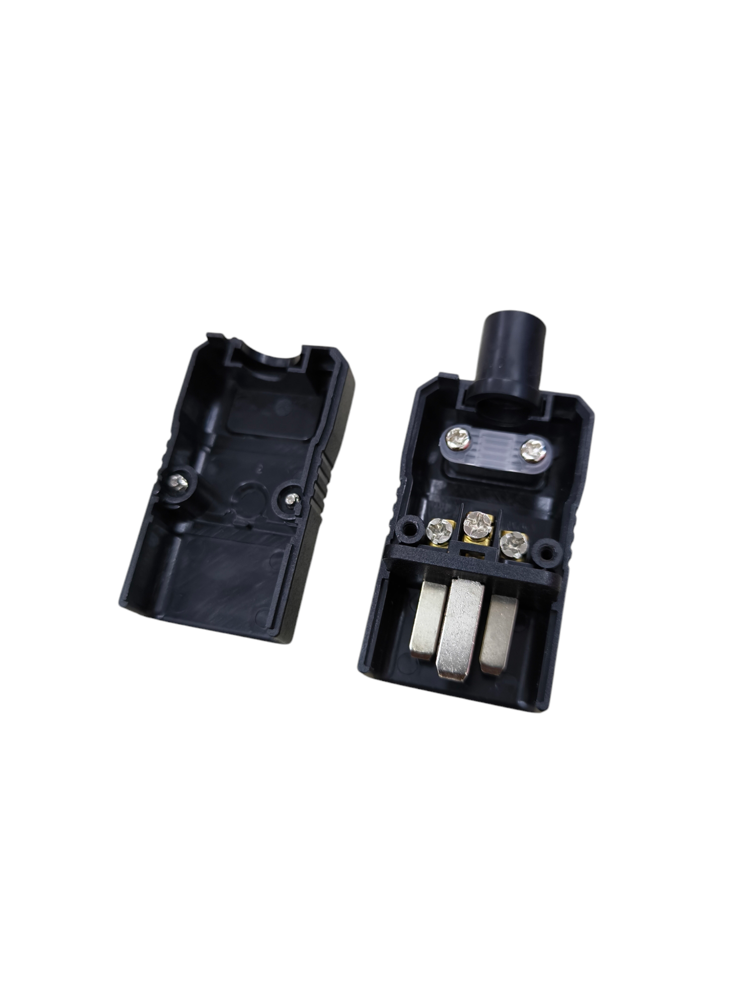 Disassembled black Computer Power Plug C20 with visible metal connectors and screws