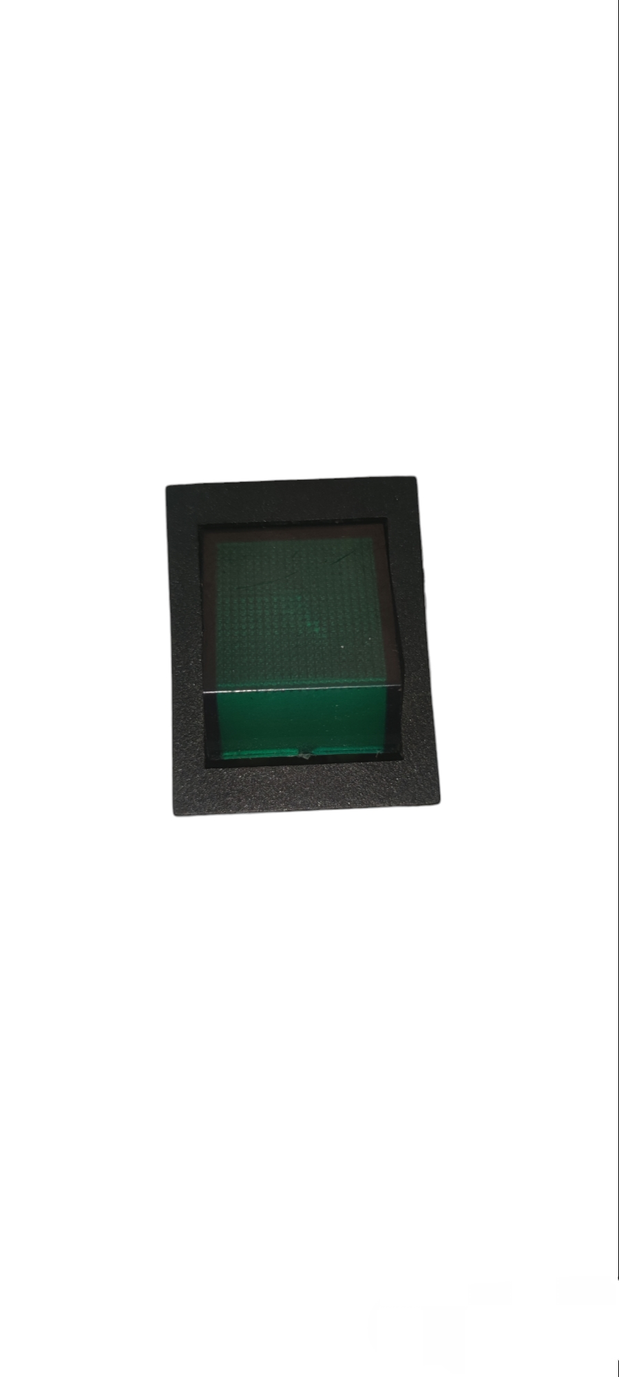 Grippes Rocker Switch Illuminated in black housing with green translucent rocker for power control