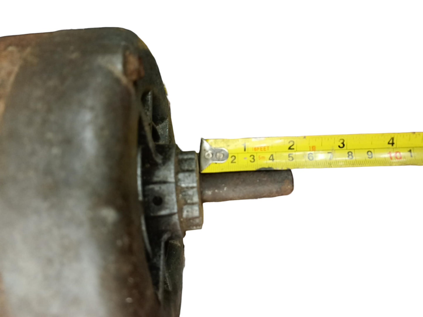 Gould electrical motor shaft in close-up measuring RPM 1725 Refurbished with yellow tape