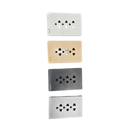 Four rectangular wall outlets in different metallic finishes (white, champagne gold, dark gray, and silver) arranged vertically on a plain white background.