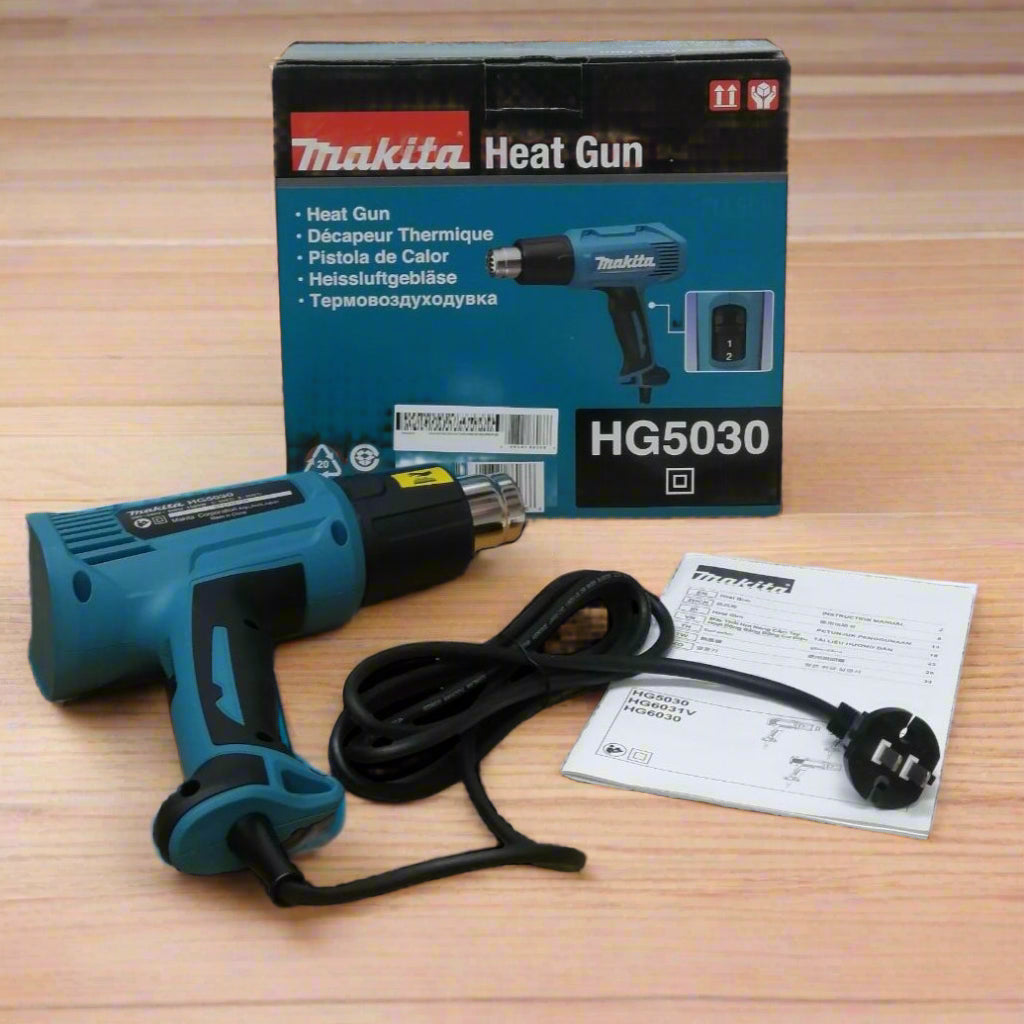 Makita 1600Watts Heat Gun 220-240Volts with power cord and user manual beside the product box