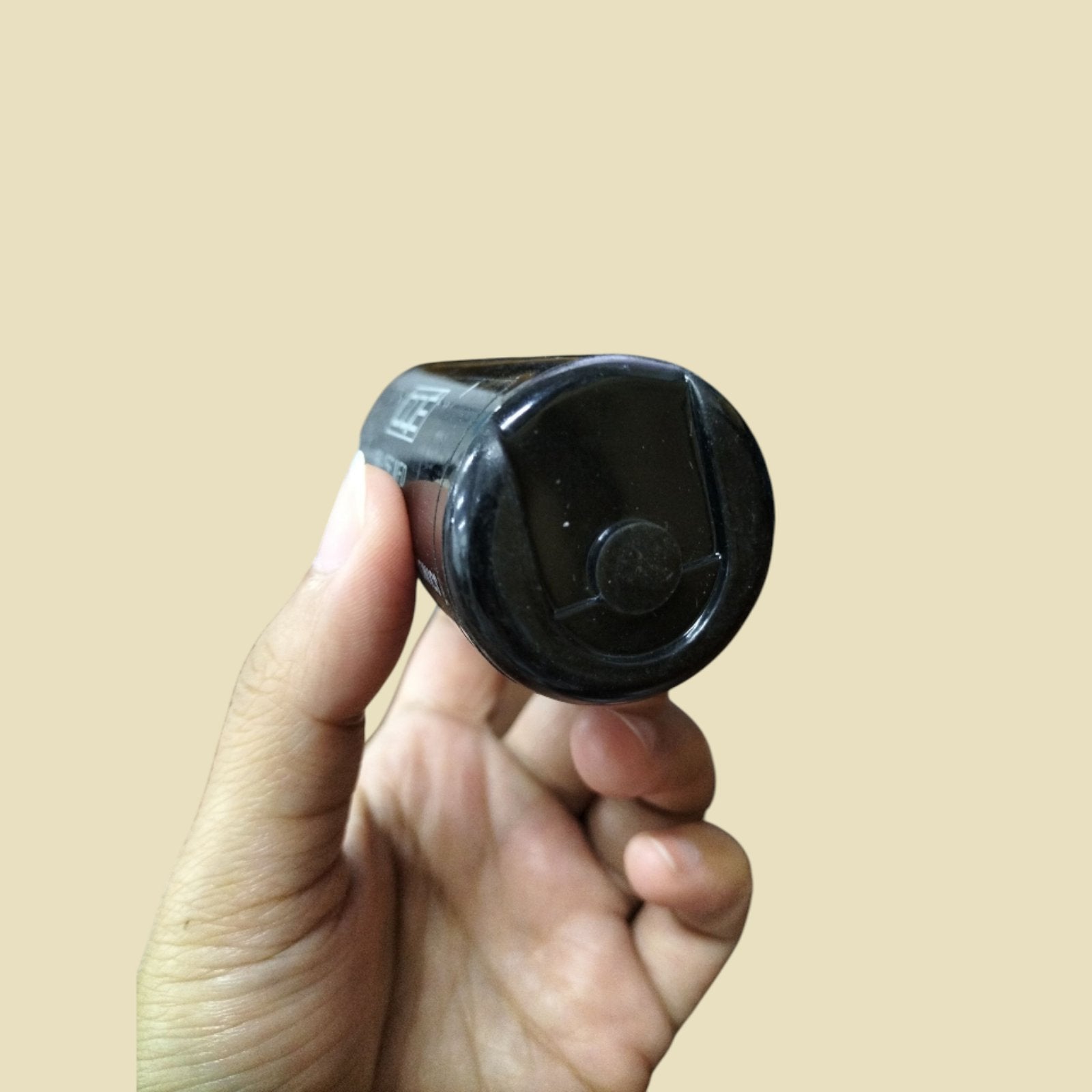 Mallory Motor Capacitor 270-324uF 220V held in hand with a sleek black design