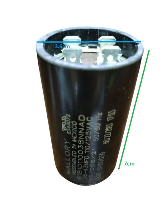 Mallory motor capacitor with black cylindrical body and metal terminals for electrical circuitry