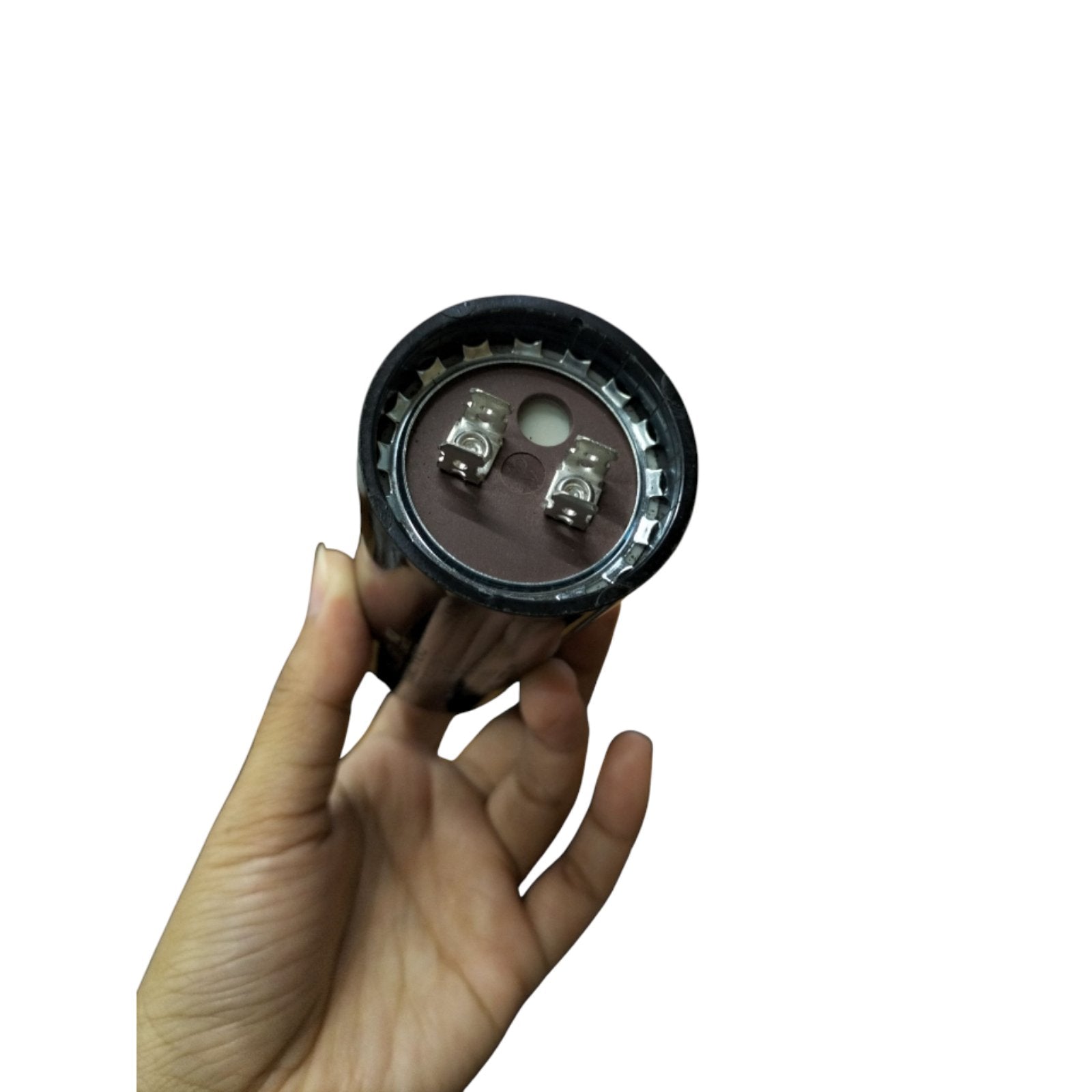 Mallory motor start capacitor 1000-1200uF held in hand showing terminal connections for electrical applications