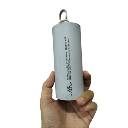 SYSCAP motor running capacitor 40uF 500V held in hand for electrical applications