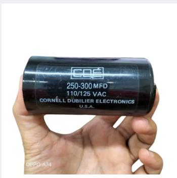 CDE Motor Start Capacitor 250-200 MFD black cylindrical electrical component held in hand
