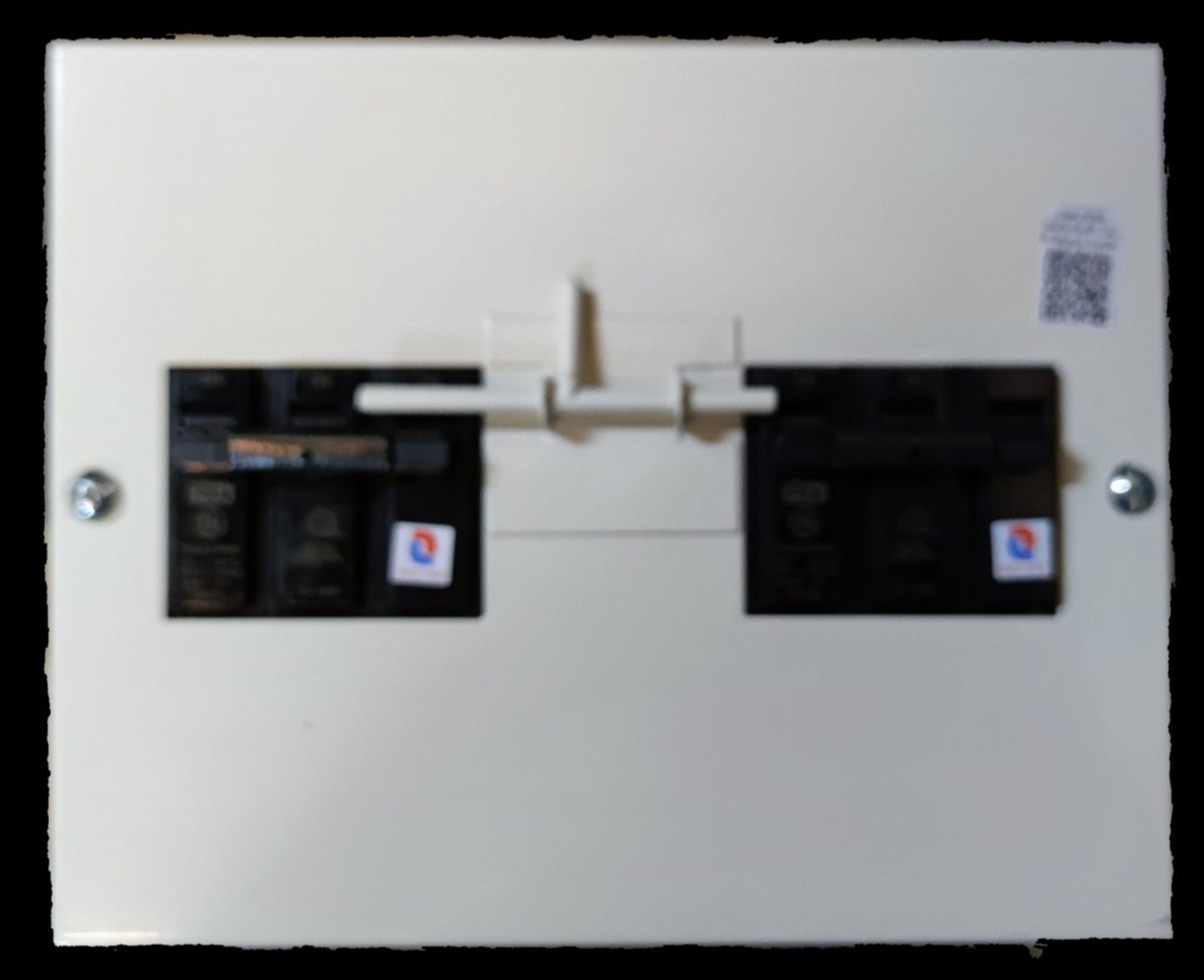 Koten and GE MTS 70A 3 Pole Three Phase electrical circuit breaker with white base and black switches