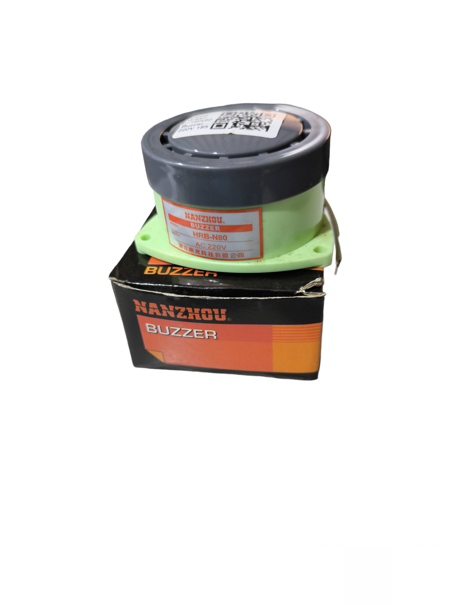 220V panel buzzer door chime device with black and green casing on black and orange box