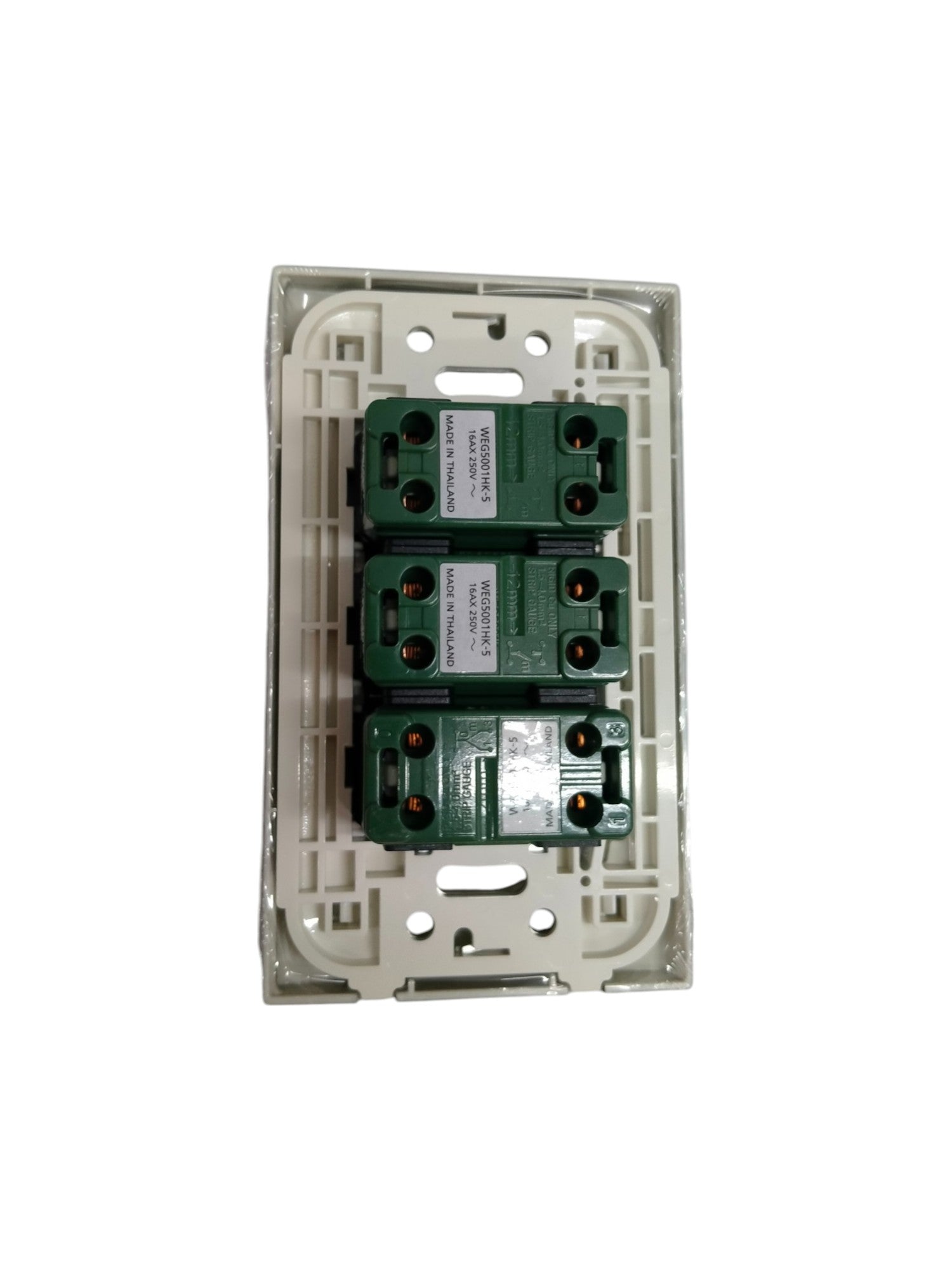 Panasonic 3 gang switch electrical component with green and white casing for power points and switches