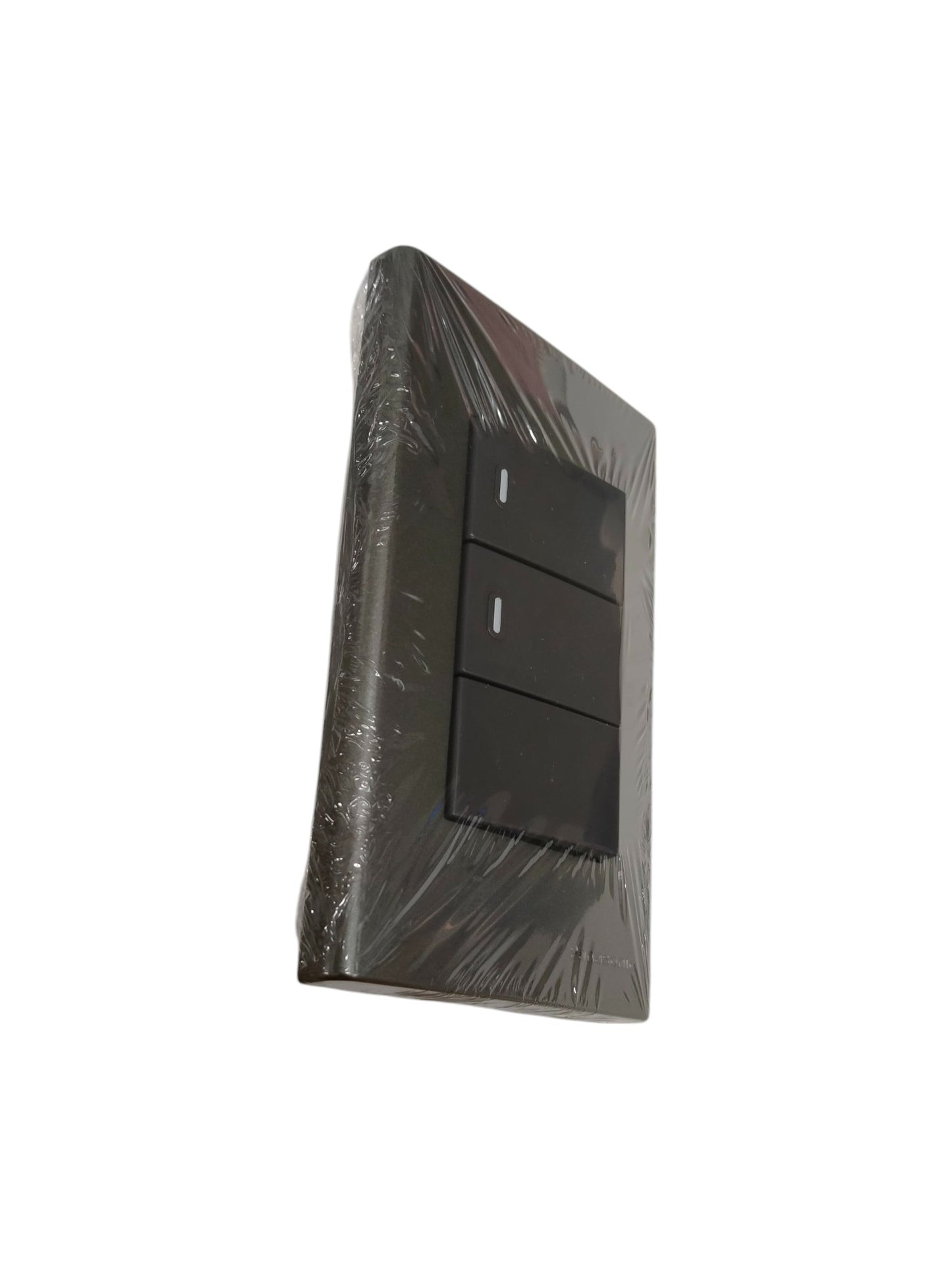 Panasonic 3 gang switch in black wrapped in protective plastic for power control