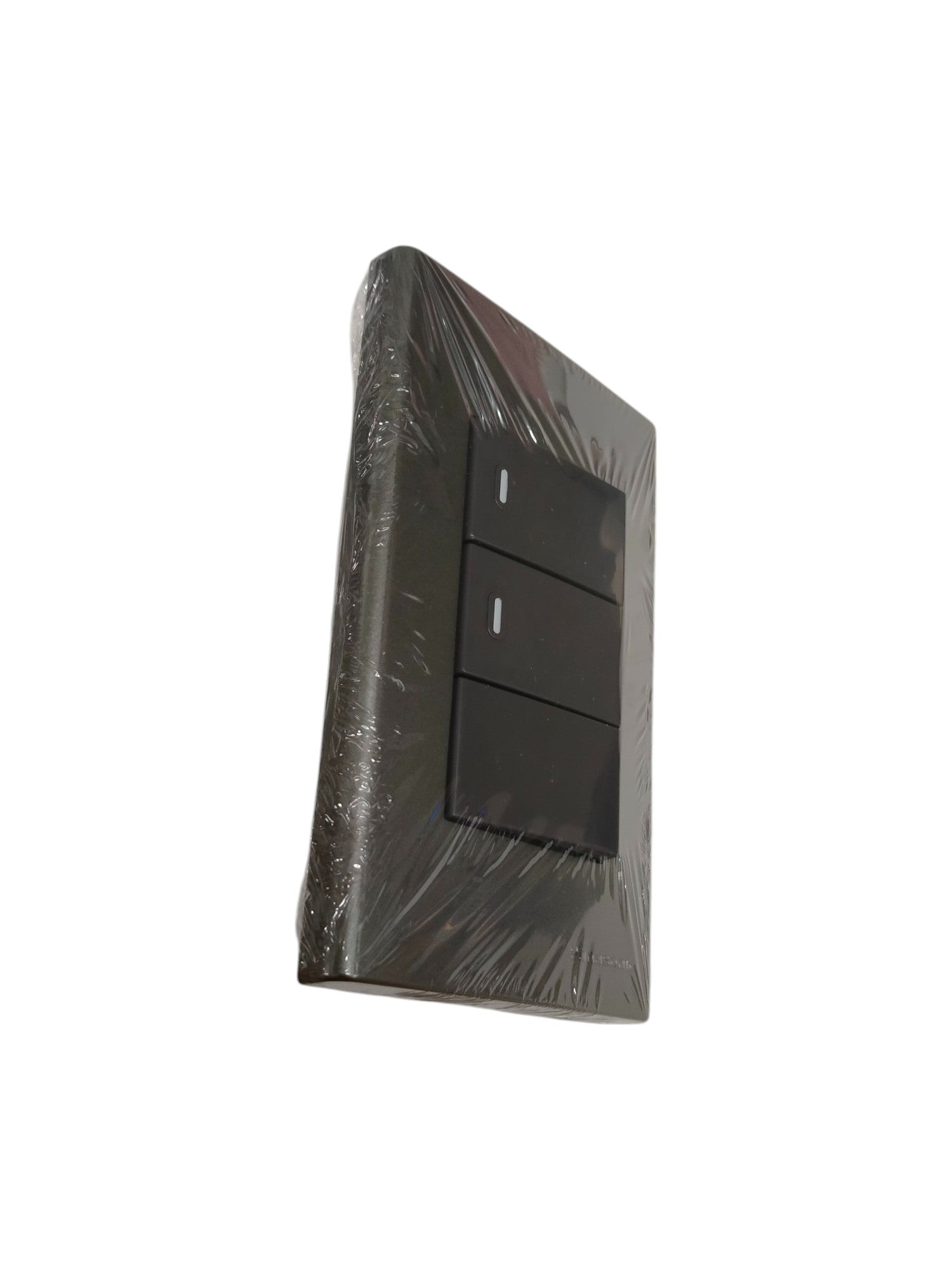 Panasonic 3 gang switch in black wrapped in protective plastic for power control