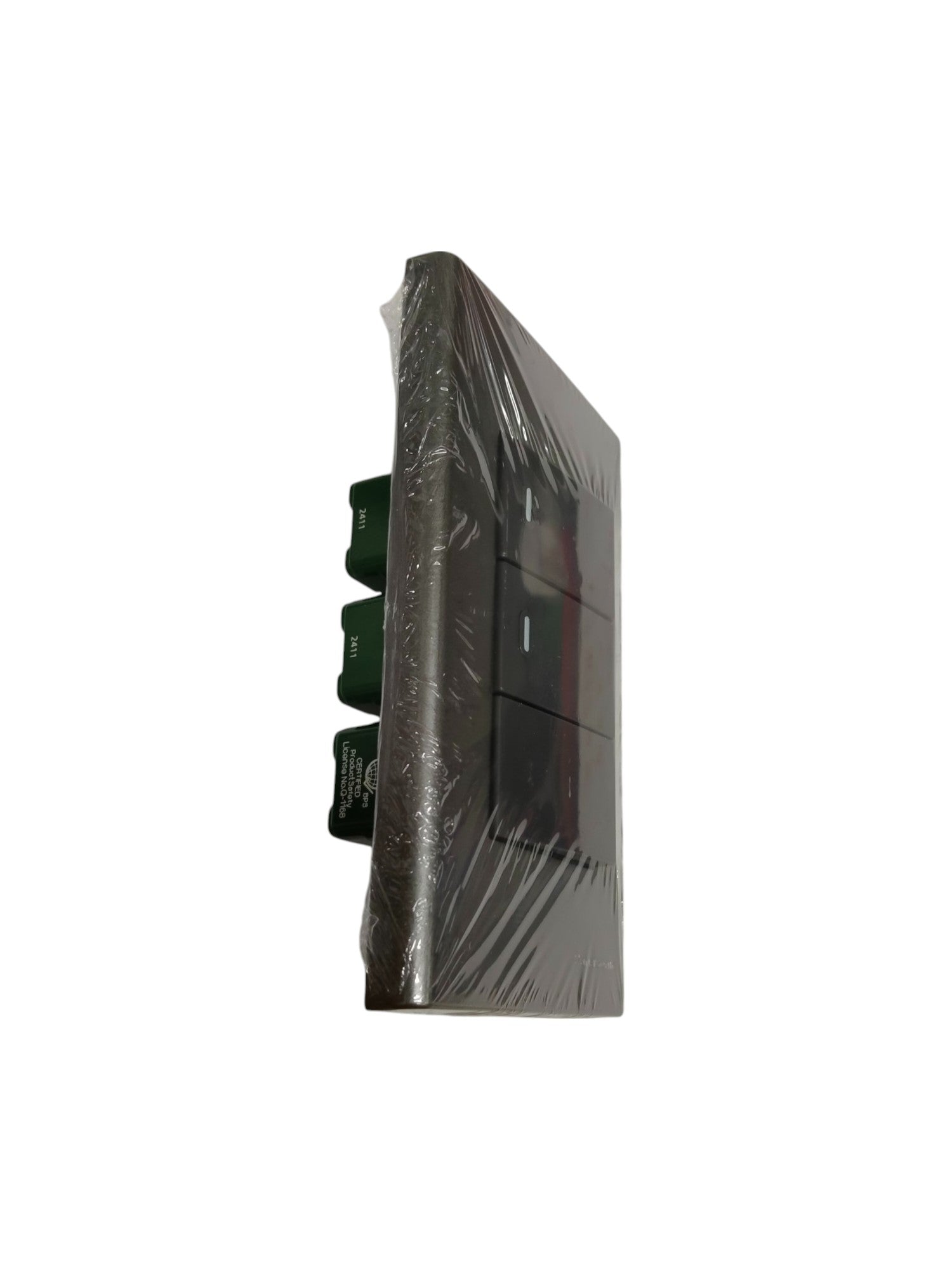 Panasonic 3 gang switch packaged in protective plastic wrapping showing side view of switch panel