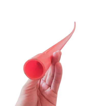 Hand holding a flexible red 40mm PVC electrical conduit pipe by Atlanta against a white background