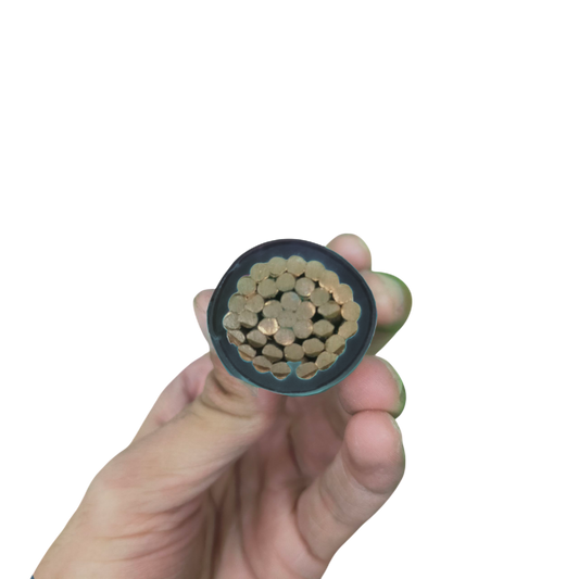 Hand holding cross-section of Philflex THHN wire 800MCM showing copper conductor strands and black insulation