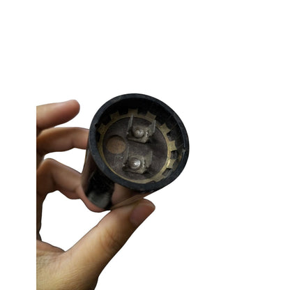 Philips Motor Capacitor 21-25uF 220V with Two Connection Terminals in a Hand