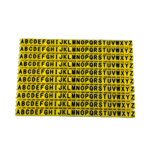 Grippes A-Z wire marker clips Yellow alphabet cable labels in rows showing black letters for organization