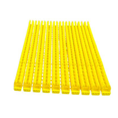 Grippes A-Z wire marker clips Yellow neatly lined on black background for cable management and cable labeling