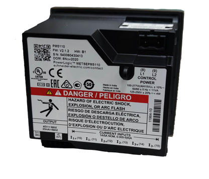 Schneider digital power meter with electrical safety warnings and multiple current input labels