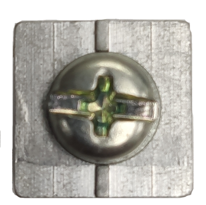 Close-up of Schneider Mechanical Lugs metal electrical part with central screw for secure connections