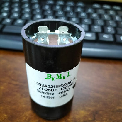 BMI Starting Capacitor 21-25MFD for Motor in black housing, designed for electrical applications