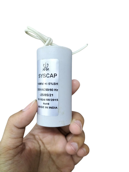 Syscap 14MFD 250 VAC Running Capacitor held in hand with white cylindrical body and wires
