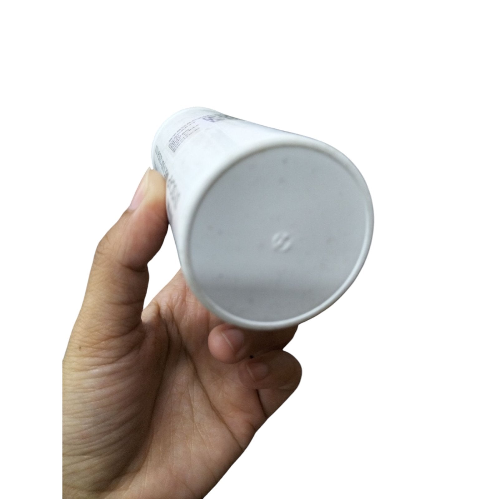 Syscap motor running capacitor 25uF 600V held in hand showcasing the cylindrical design and label