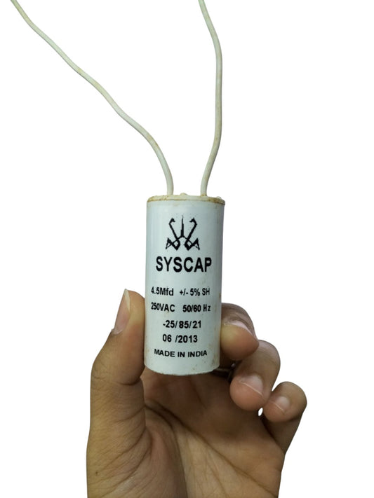 Syscap Motor Running Capacitor 4.5MFD 250VAC 50-60Hz held in hand for electrical circuitry