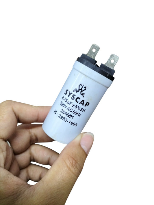 Syscap Running Capacitor 4.75MFD 350 VAC held in hand for electrical circuitry use