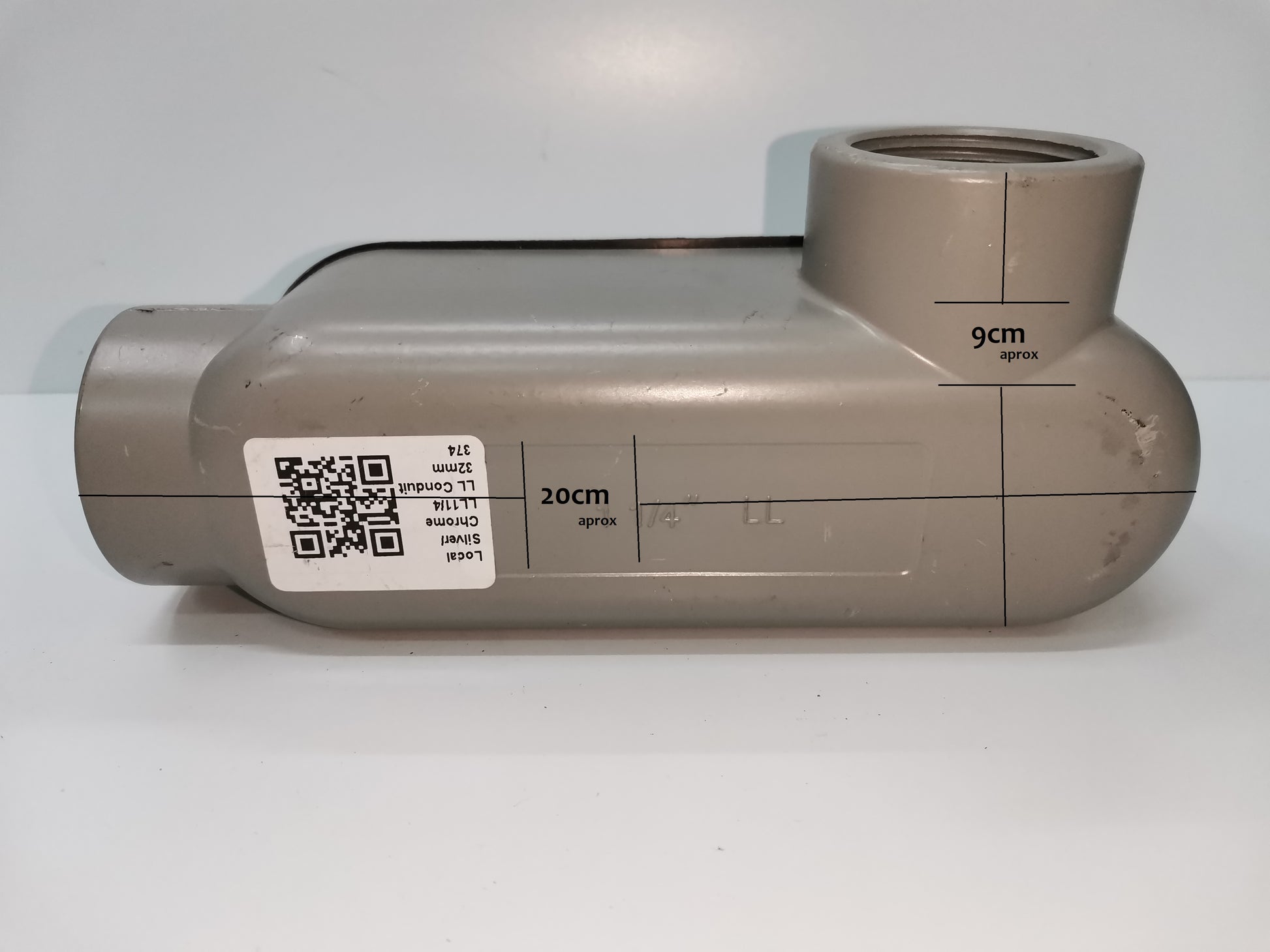 Threaded LL conduit body in gray with measurement markings for electrical circuitry installation