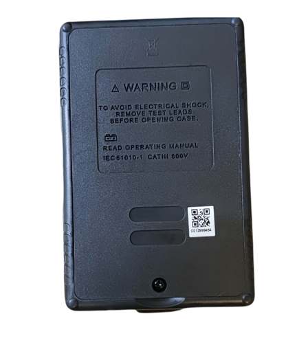 Back view of Electx Electrical Supply digital earth leakage tester showing warning label and safety instructions