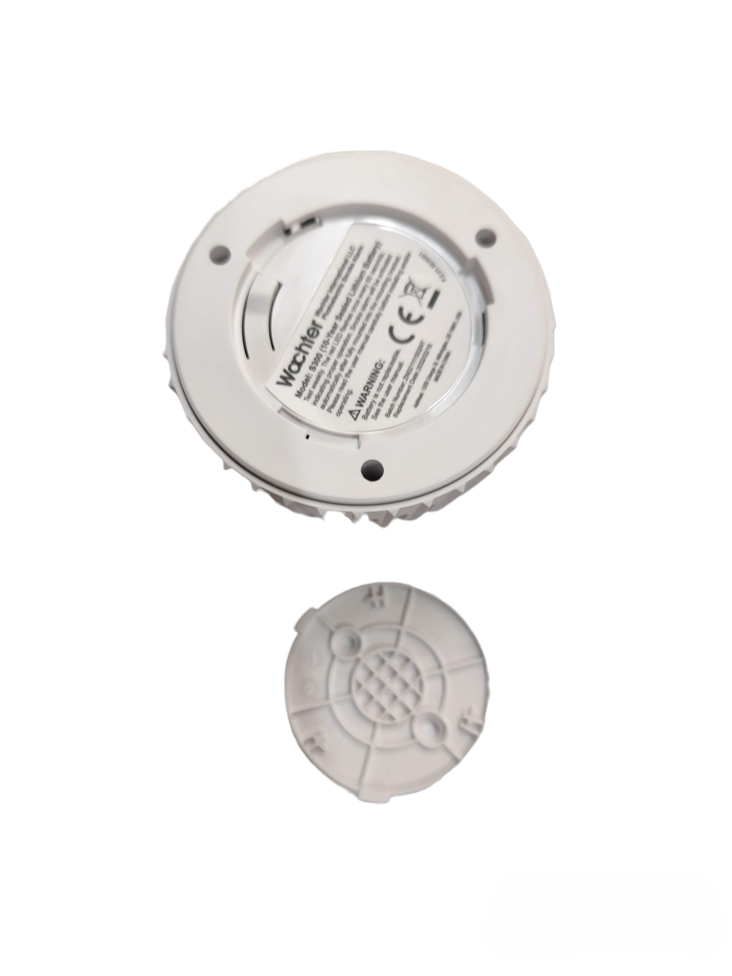 Watcher photoelectric smoke alarm with battery showing back view and mounting plate for security system