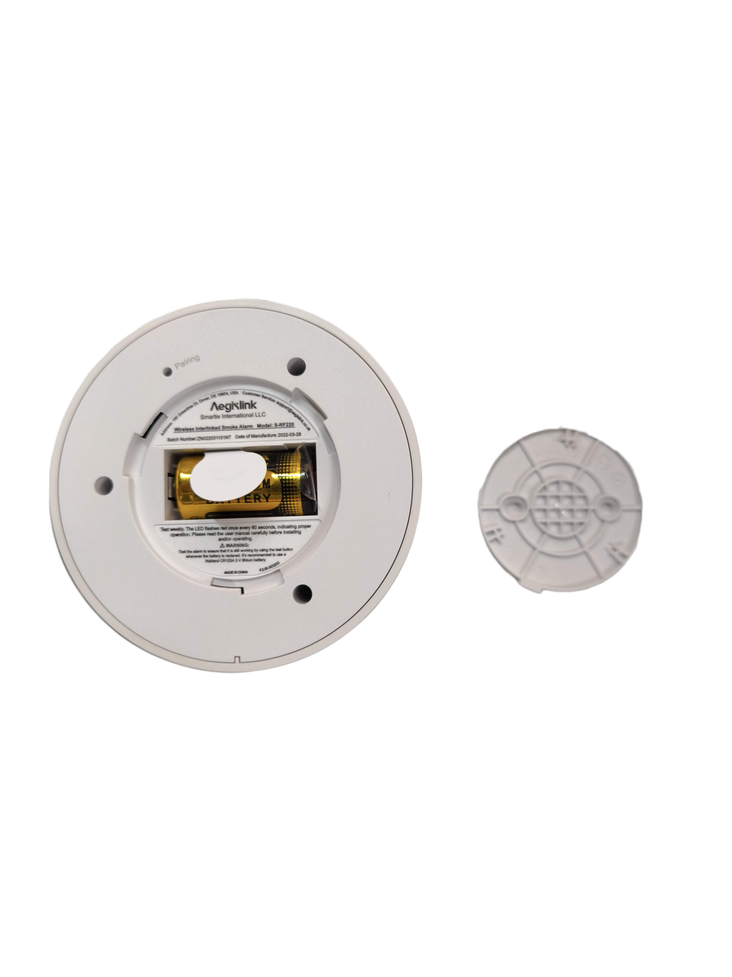 Aegislink Wireless Interlinked Smoke Alarm showing battery compartment and back cover removed